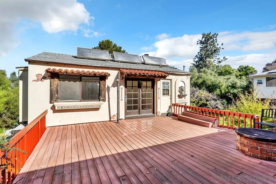 12731 Stone Canyon Road Poway, CA 92064 - Photo 31 of 44 a view of a house with a large window and wooden floor