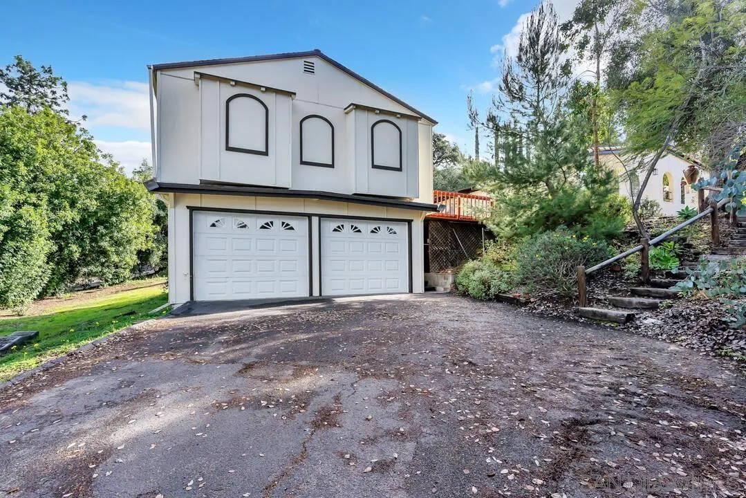 12731 Stone Canyon Road Poway, CA 92064 - Photo 38 of 44 a view of a house with a outdoor space