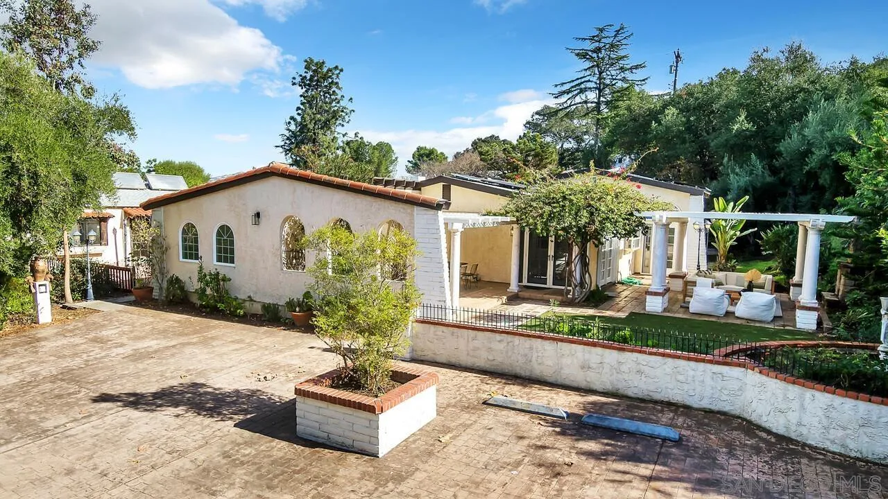 12731 Stone Canyon Road Poway, CA 92064 - Photo 42 of 44 a front view of a house with garden