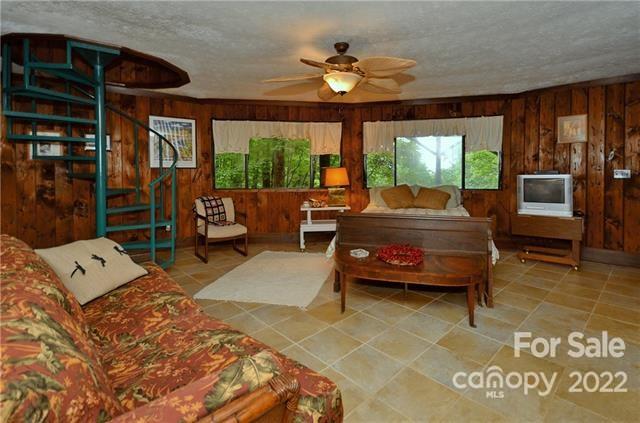 55 Summit Road Tryon, NC 28782 - Photo 18 of 23 a living room with furniture and a large window