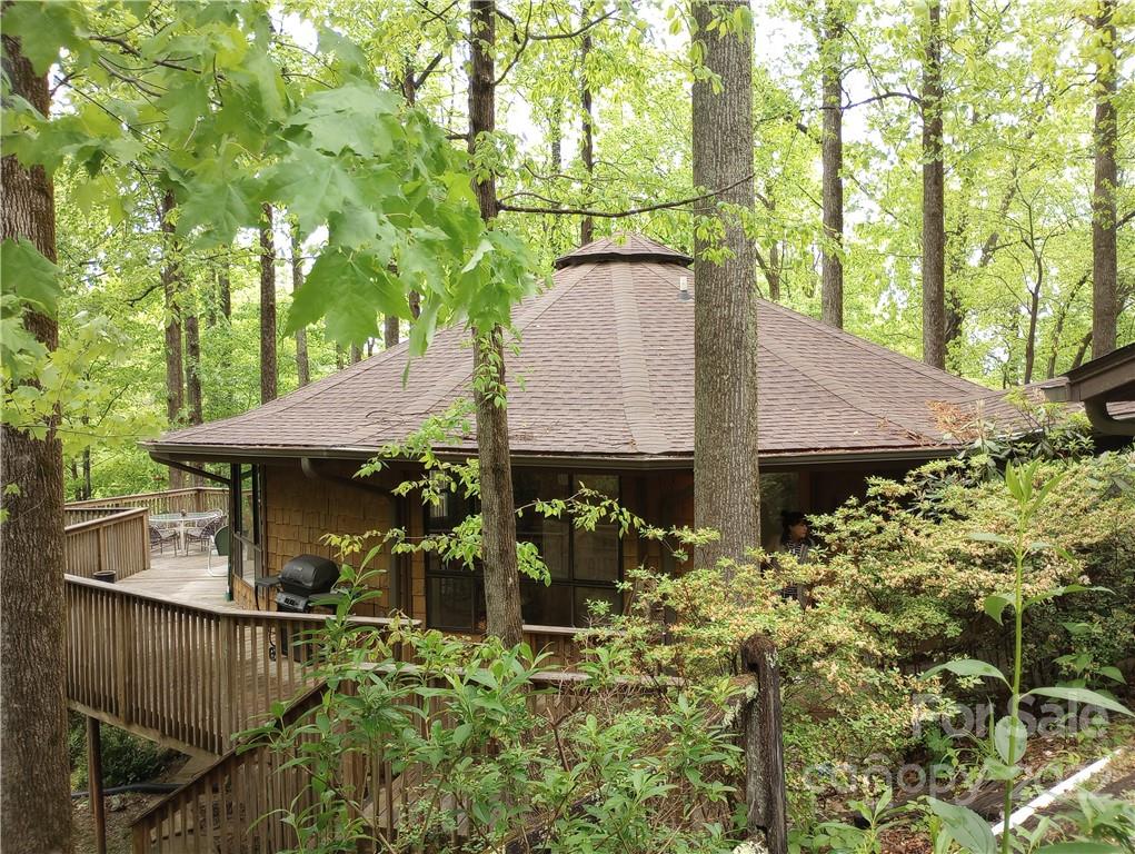 55 Summit Road Tryon, NC 28782 - Photo 22 of 23 a view of house along with trees