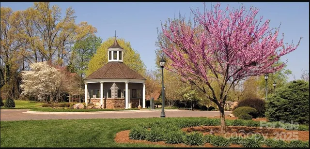 a view of a studio with lots of gym equipment