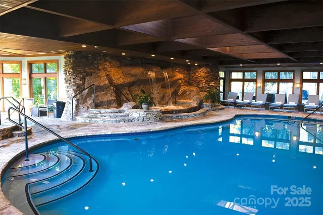 a view of a chairs and table in a room