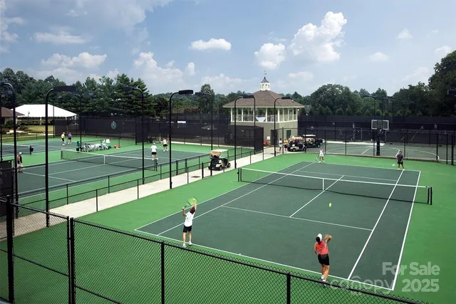 a view of tall house with a tree