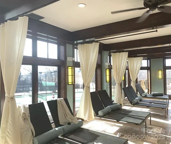 a view of kitchen with a large window