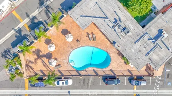an aerial view of residential building and lake view