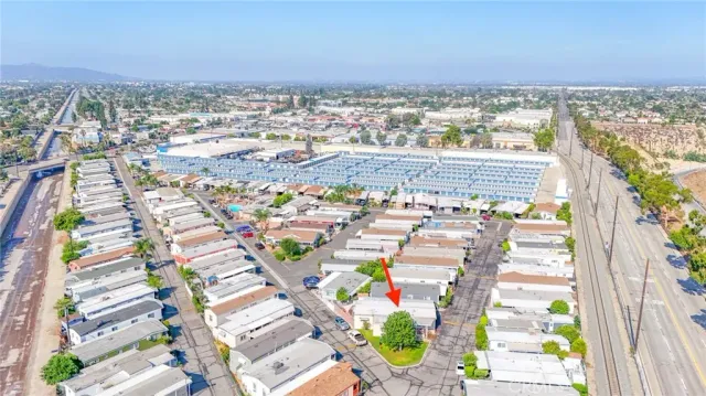 an aerial view of residential building and parking space