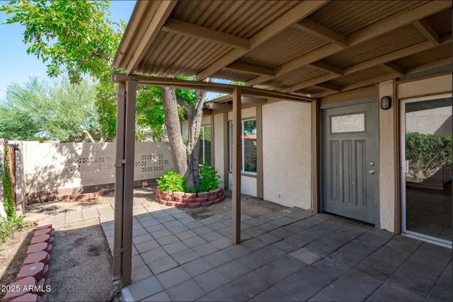 a view of a porch with seating space