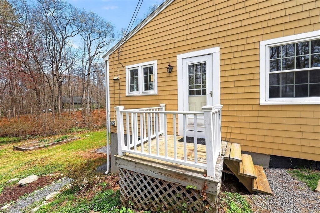 15 Leigh Road Norwell, MA 02061 - Photo 23 of 34 a view of a house with backyard and sitting area