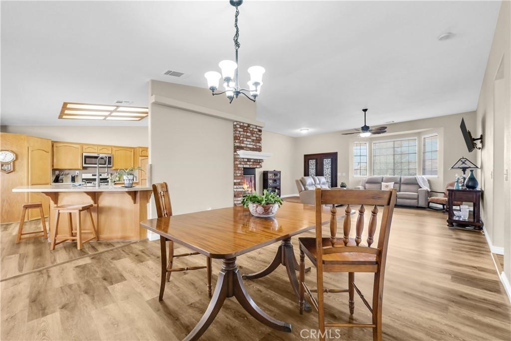 13931 Falling Leaf Road Apple Valley, CA 92307 - Photo 6 of 50 Back view of Dining area with view into kitchen