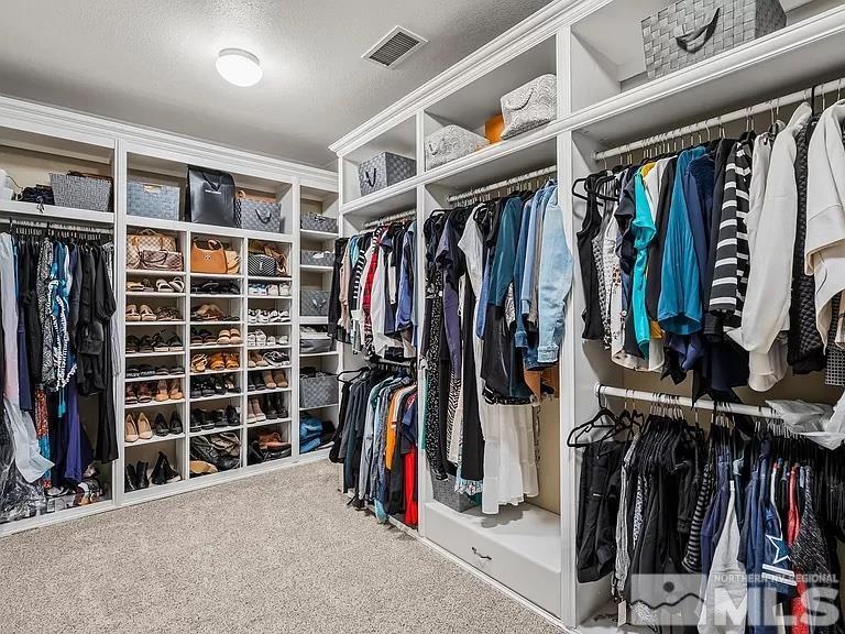 2725 Foxhunter Lane Reno, NV 89521 - Photo 13 of 25 a view of walk in closet with clothes and shoes