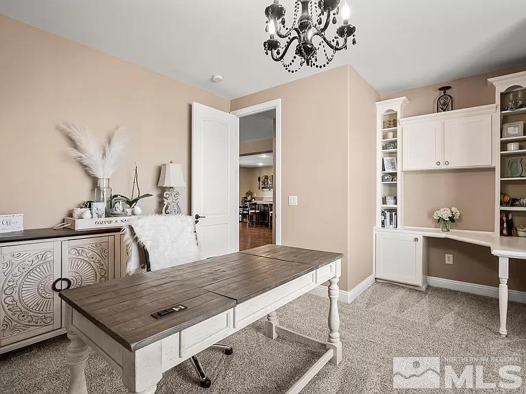 2725 Foxhunter Lane Reno, NV 89521 - Photo 15 of 25 a living room with stainless steel appliances kitchen island granite countertop furniture and a kitchen view