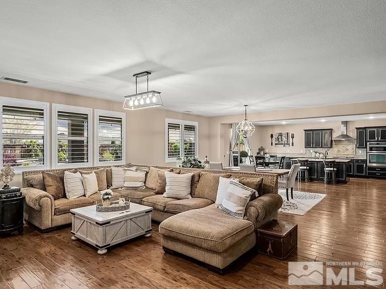 2725 Foxhunter Lane Reno, NV 89521 - Photo 2 of 25 a living room with furniture and a large window