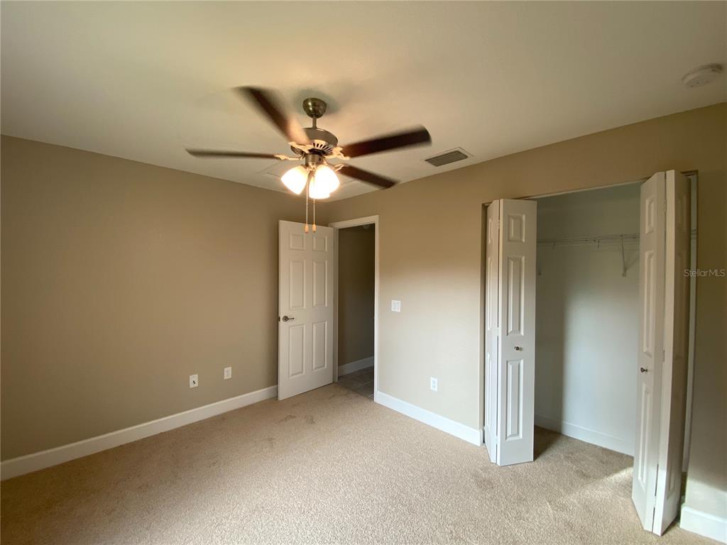 3011 Southwest 140th Loop Ocala, FL 34473 - Photo 10 of 22 an empty room with a bathroom