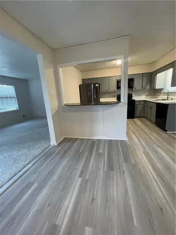 a view of kitchen and kitchen island