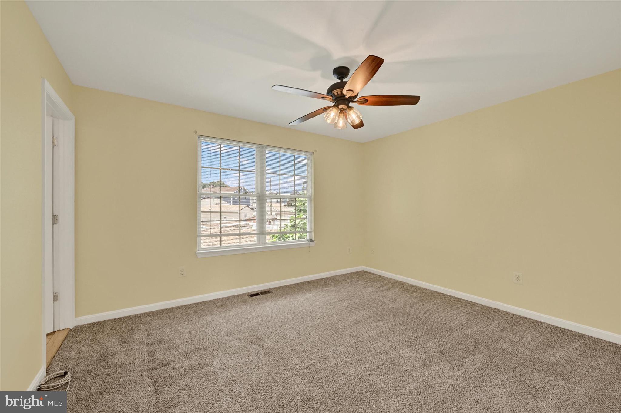21 Box Circle Baltimore, MD 21221 - Photo 11 of 23 a view of room with a ceiling fan and window