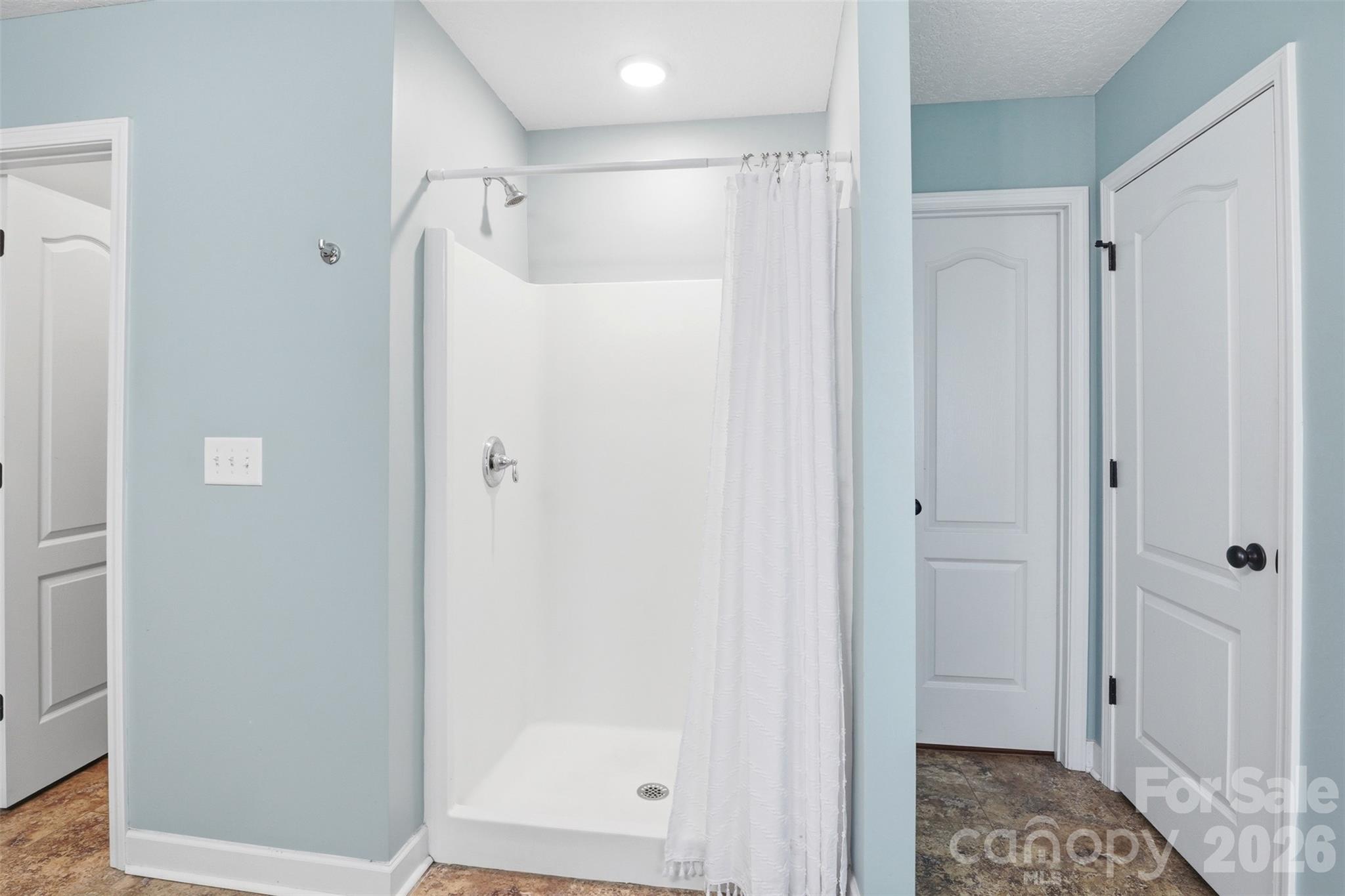 810 Tirzah Road York, SC 29745 - Photo 17 of 29 a bathroom with a glass shower door
