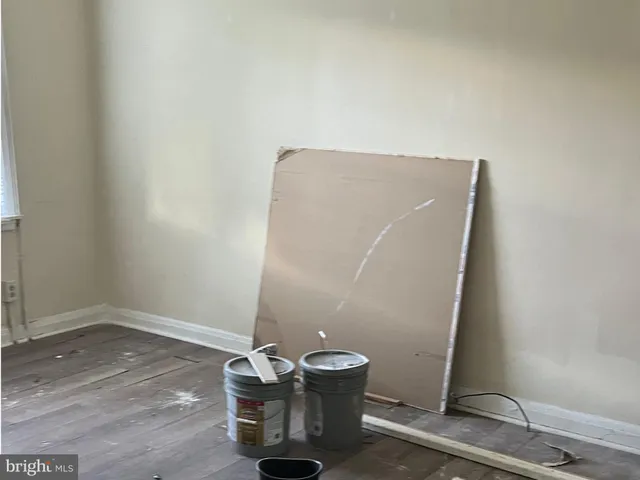 an empty room with a bench