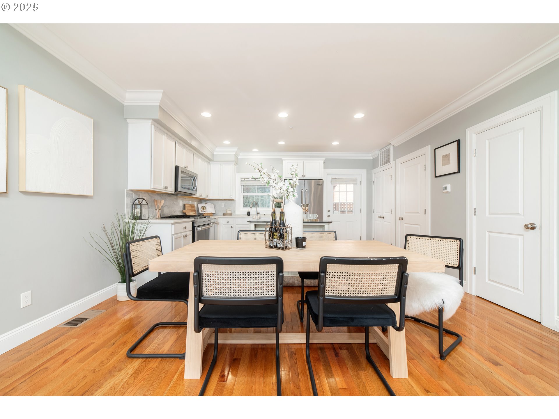 623 Northeast Randall Avenue Portland, OR 97232 - Photo 11 of 26 a dining room with furniture and wooden floor