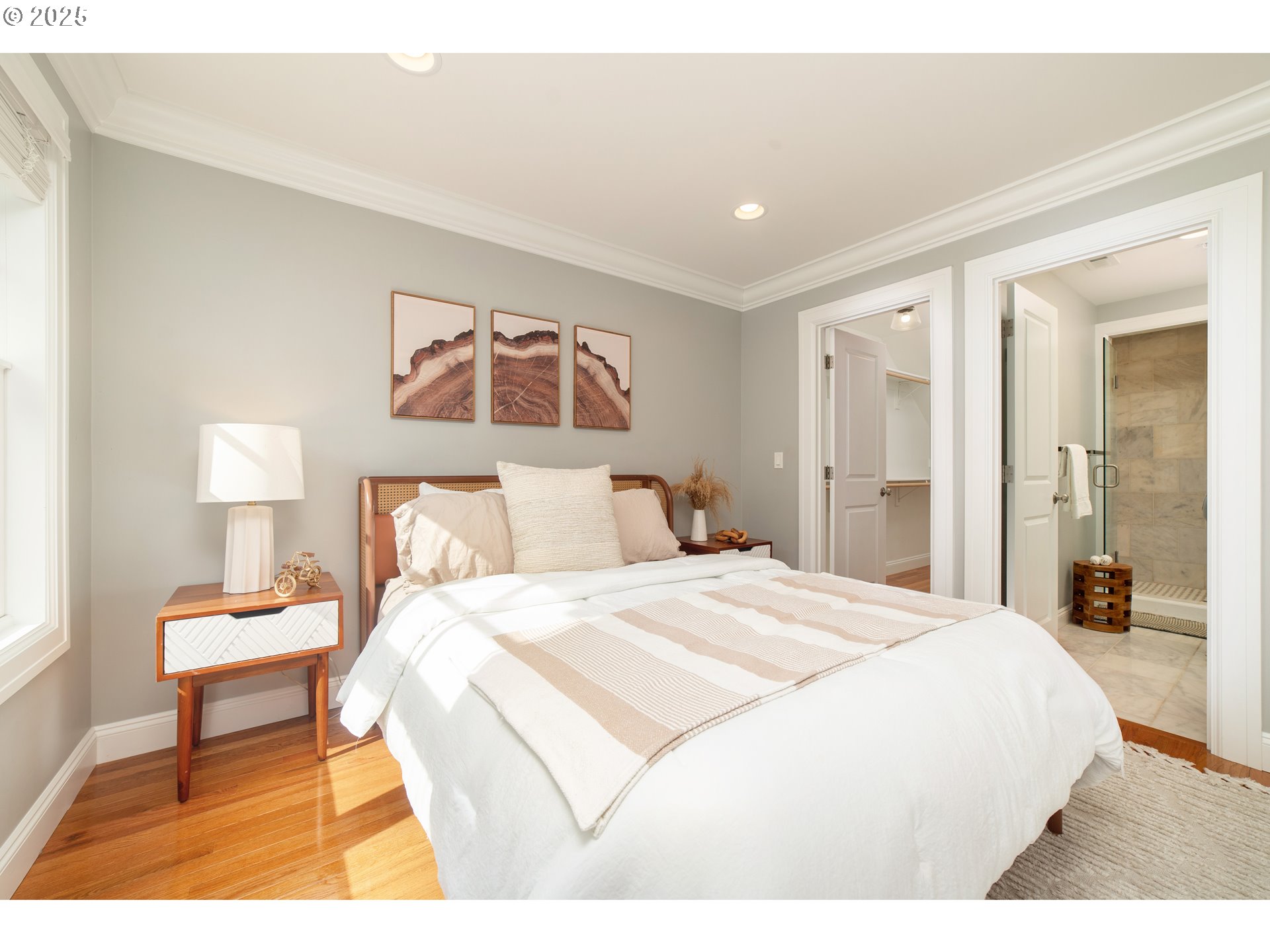 623 Northeast Randall Avenue Portland, OR 97232 - Photo 12 of 26 a bedroom with a bed and a lamp on table