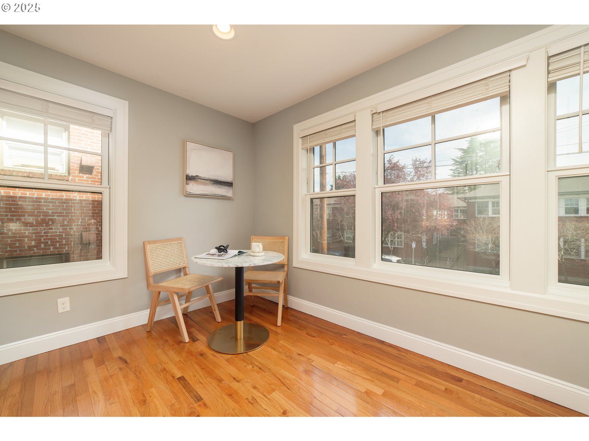 623 Northeast Randall Avenue Portland, OR 97232 - Photo 16 of 26 a work room with wooden floor and a window