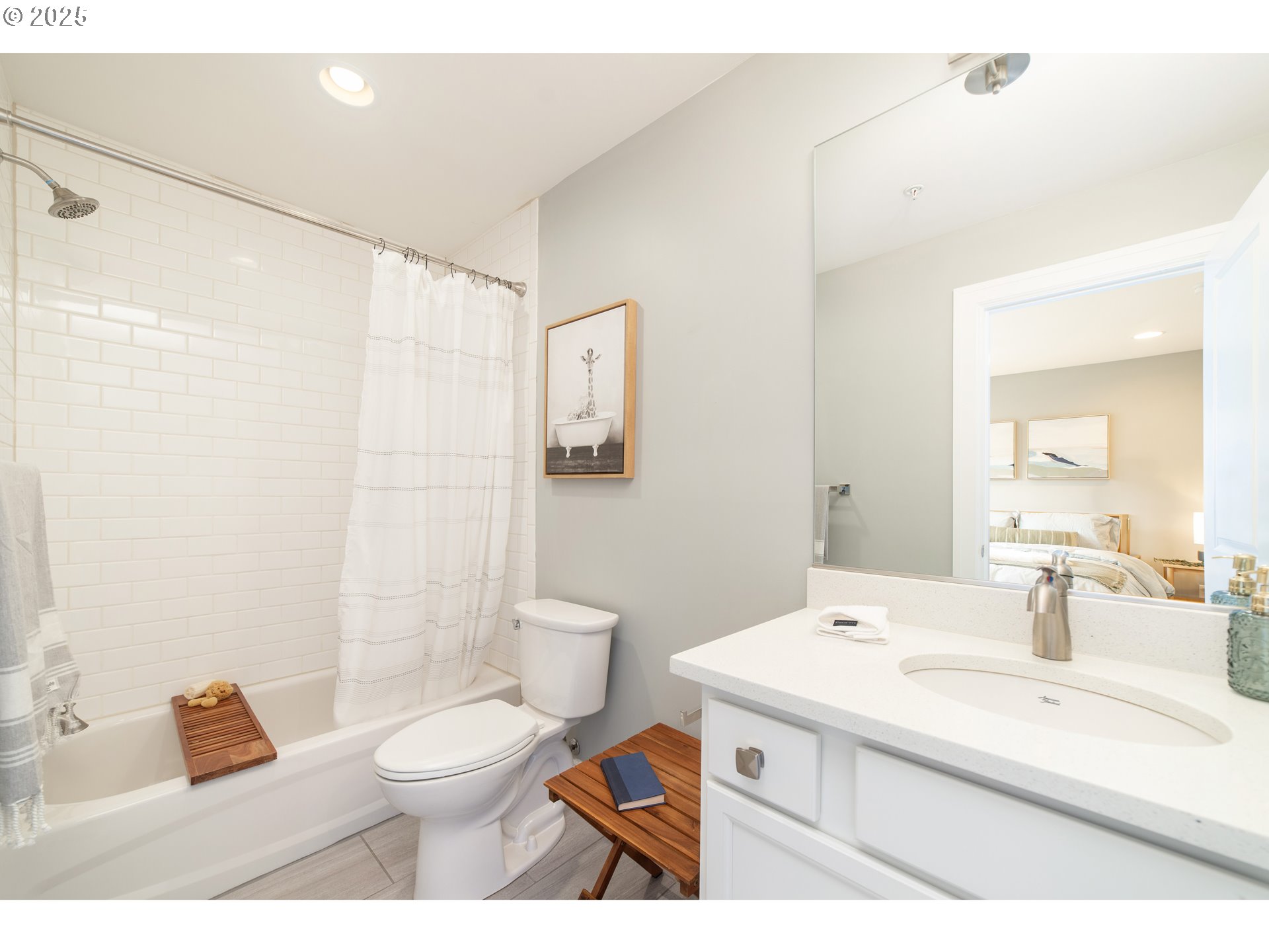 623 Northeast Randall Avenue Portland, OR 97232 - Photo 18 of 26 a bathroom with a sink toilet vanity and shower