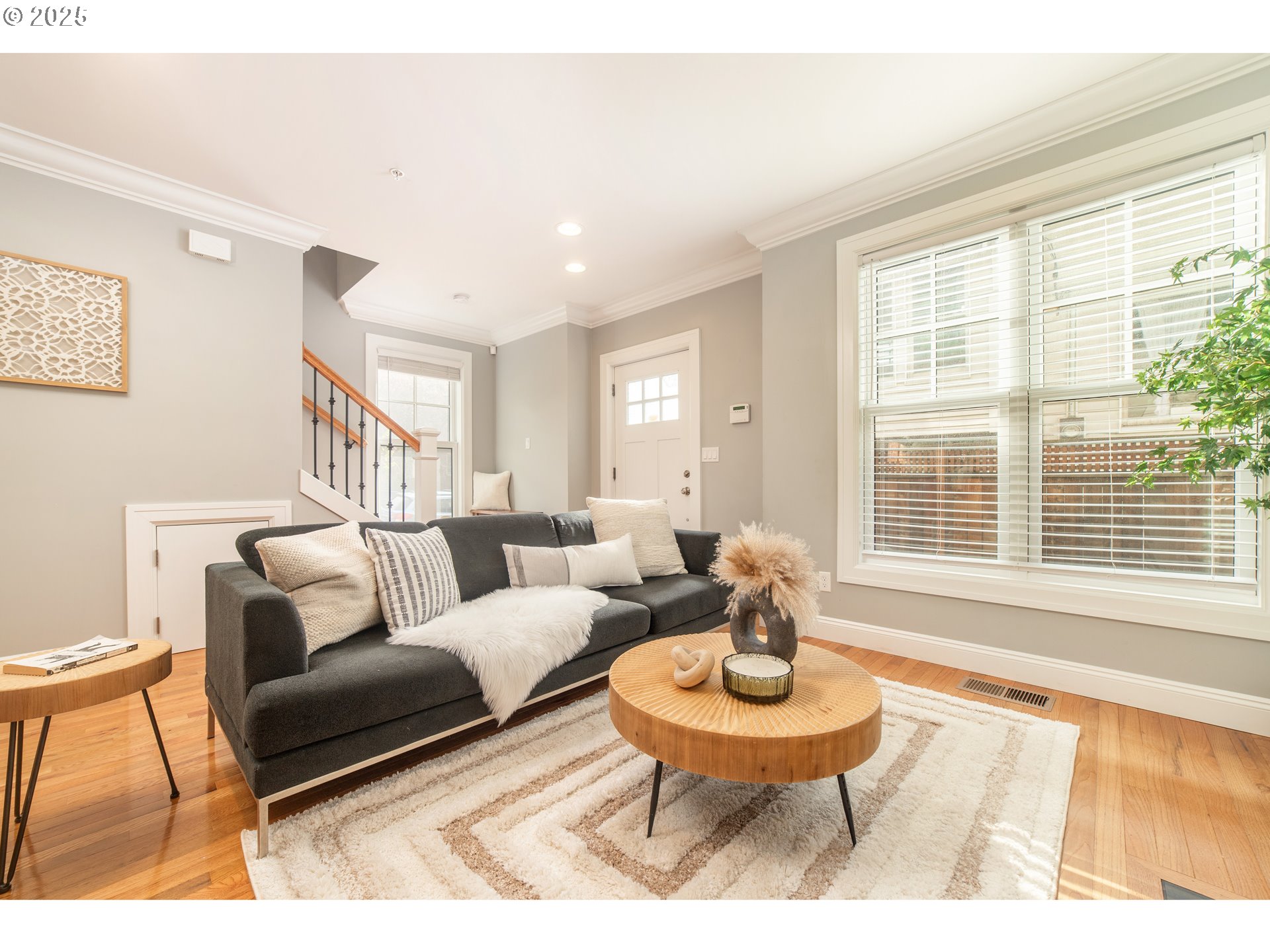 623 Northeast Randall Avenue Portland, OR 97232 - Photo 2 of 26 a living room with furniture and a large window