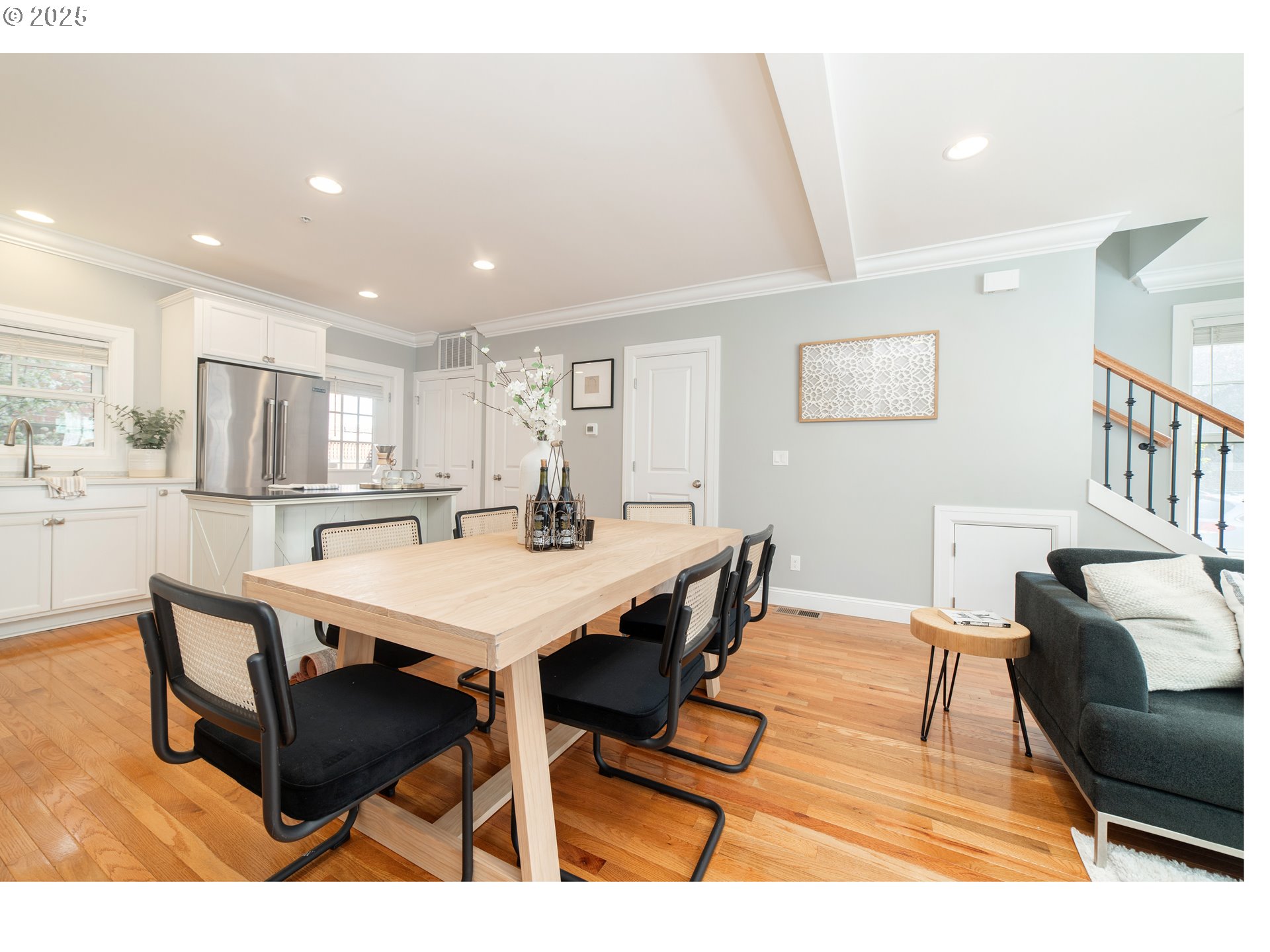 623 Northeast Randall Avenue Portland, OR 97232 - Photo 10 of 26 a dining room with furniture and a wooden floor