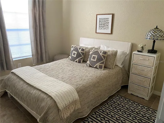 a kitchen with stainless steel appliances granite countertop a refrigerator sink and stove