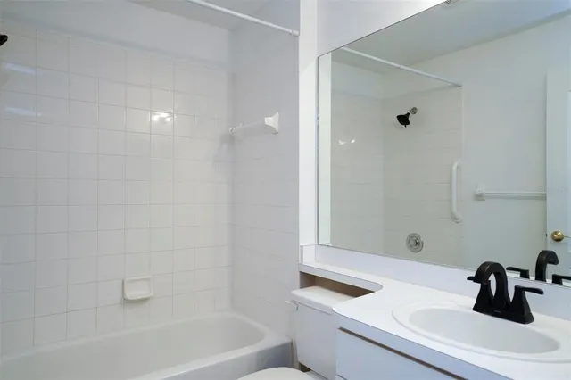 a close up of a bathtub in a bathroom