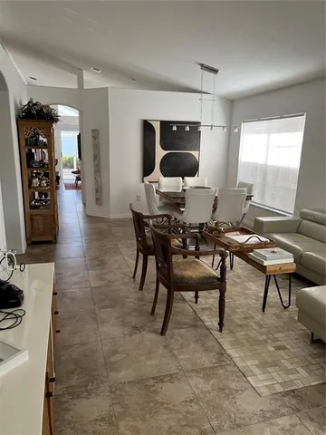 a view of a hallway with a window