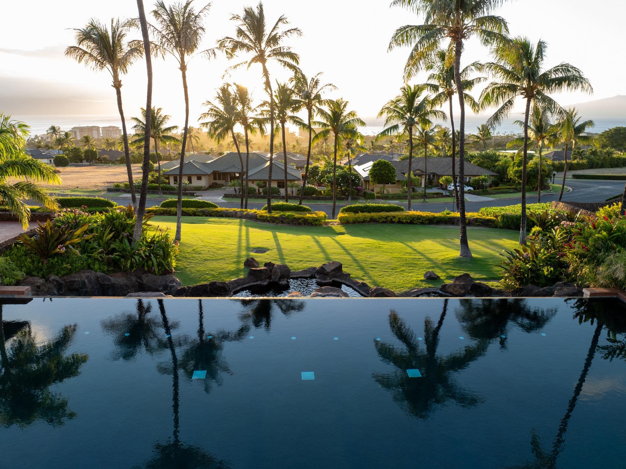 144 Anapuni Loop Lahaina, HI 96761 - Photo 15 of 21 a view of an swimming pool with a seating space