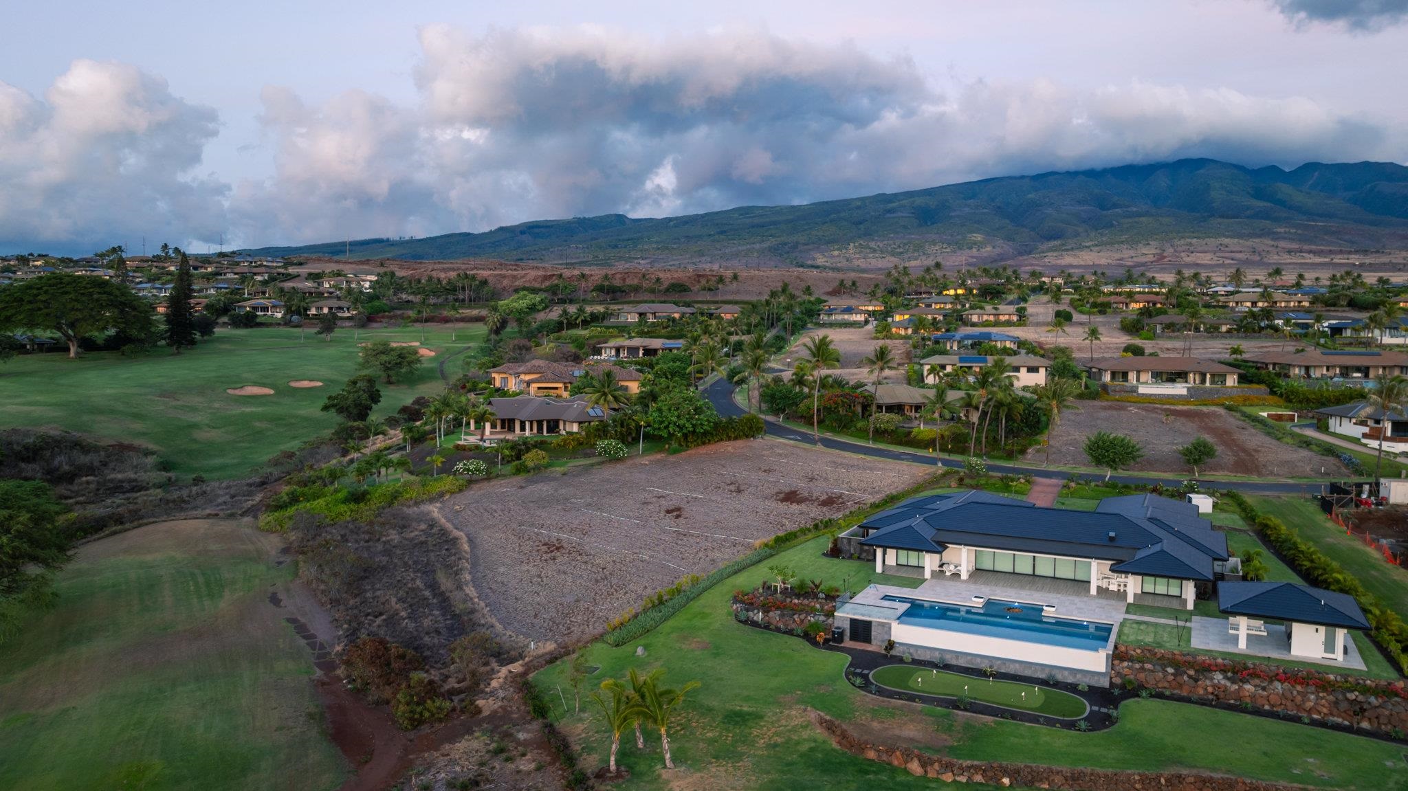 144 Anapuni Loop Lahaina, HI 96761 - Photo 6 of 21 an aerial view of a house with a garden