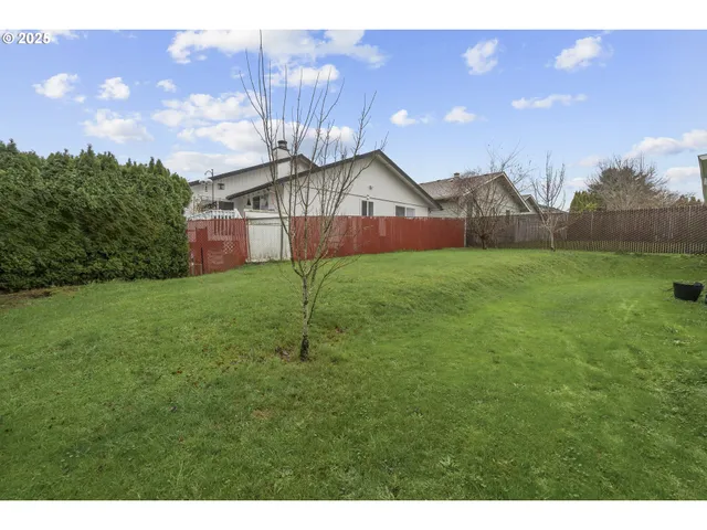 a house view with a garden space