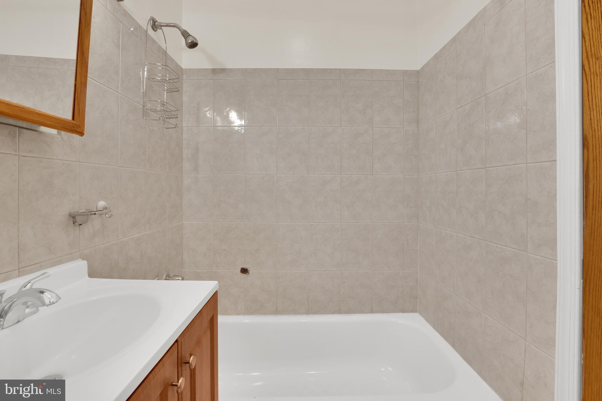 5731 9th Street Northwest Washington, DC 20011 - Photo 24 of 36 a bathroom with a sink and a bathtub