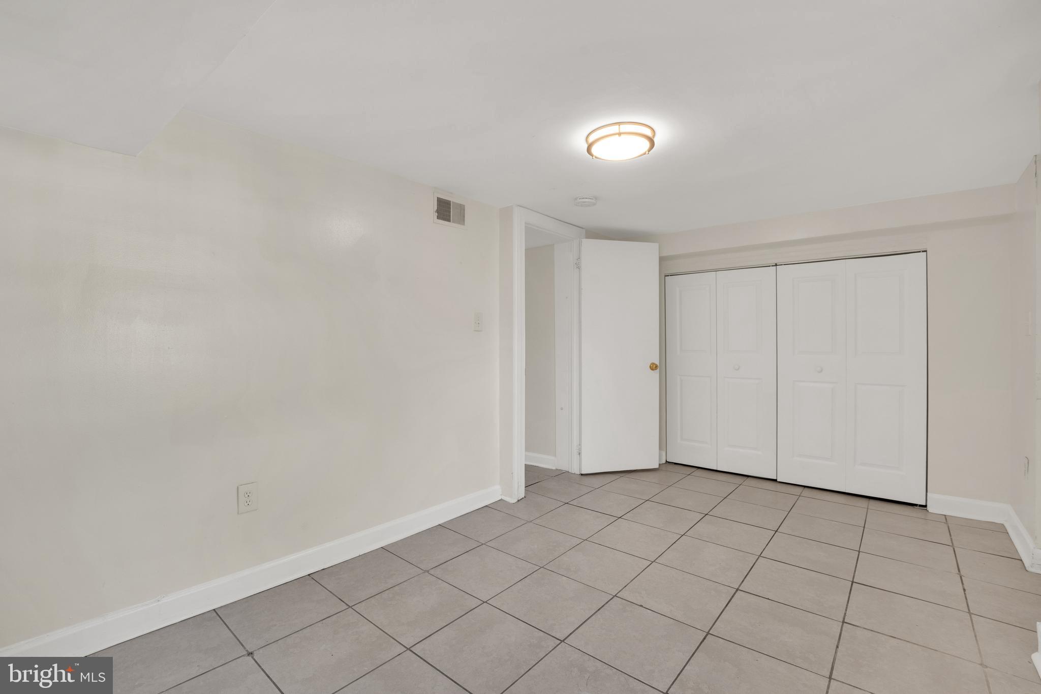 5731 9th Street Northwest Washington, DC 20011 - Photo 25 of 36 a view of an empty room