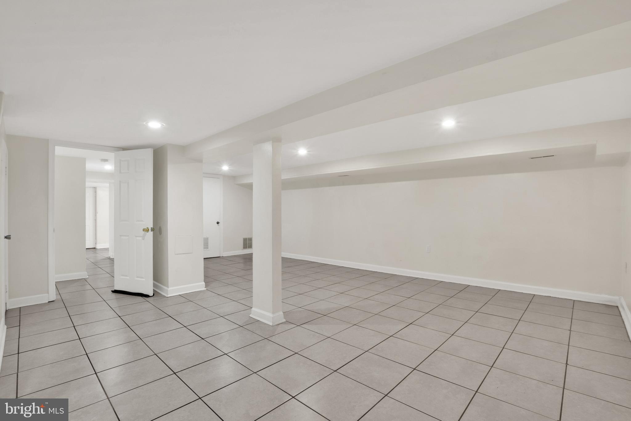 5731 9th Street Northwest Washington, DC 20011 - Photo 26 of 36 a view of an empty room and window