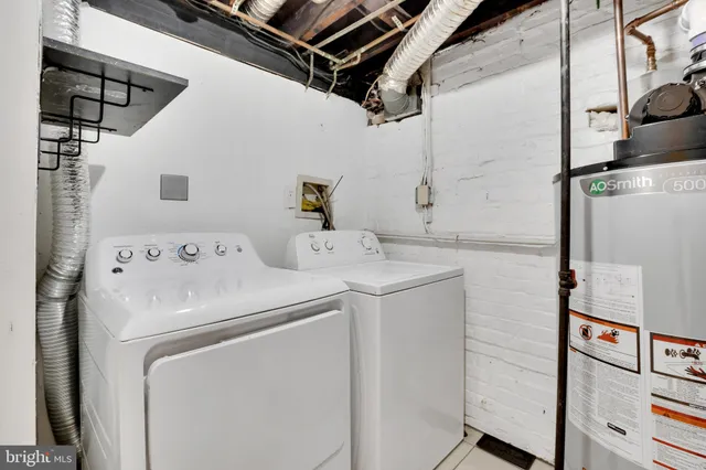 a utility room with dryer and washer
