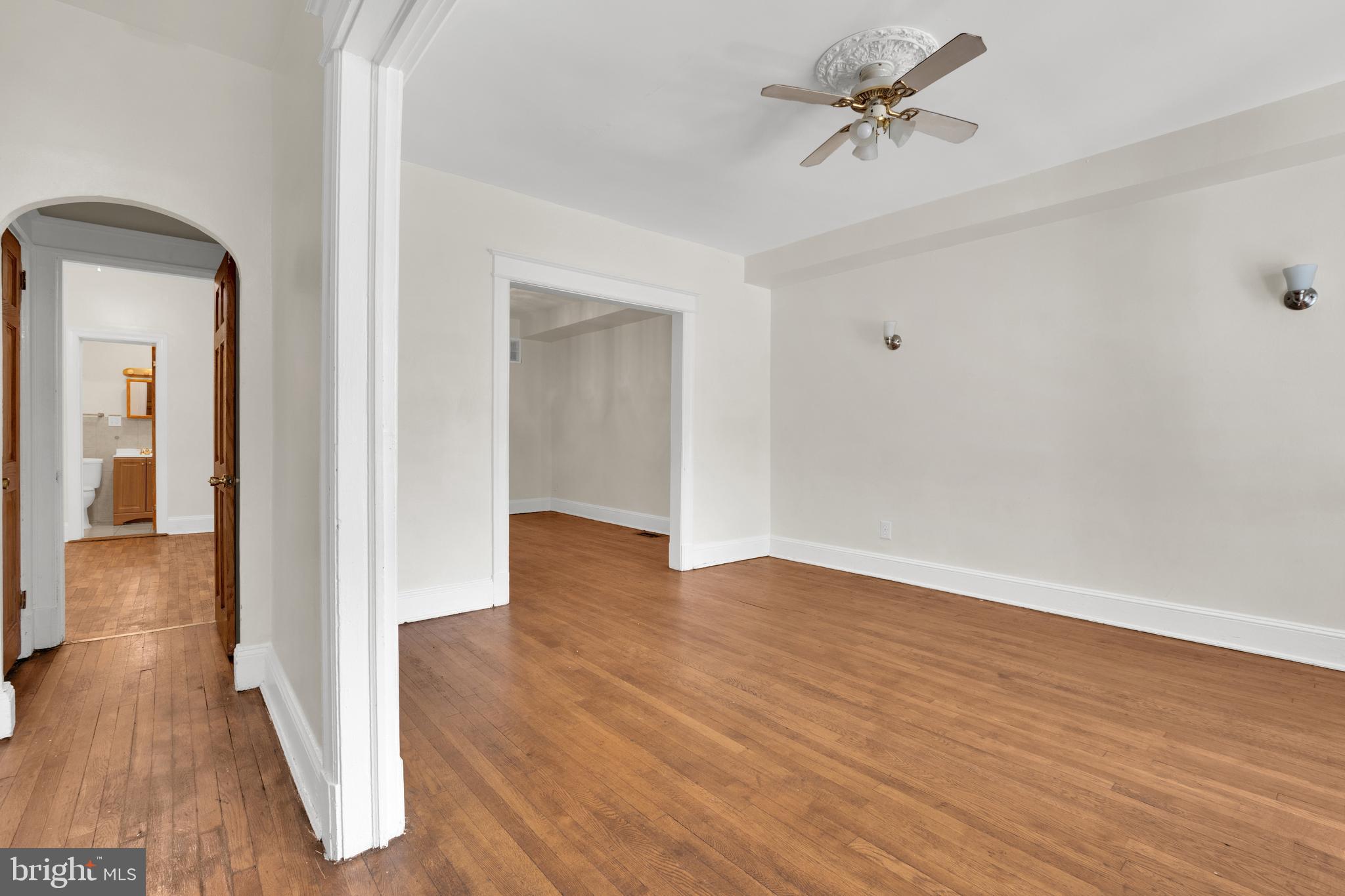 5731 9th Street Northwest Washington, DC 20011 - Photo 8 of 36 wooden floor in an empty room with a window