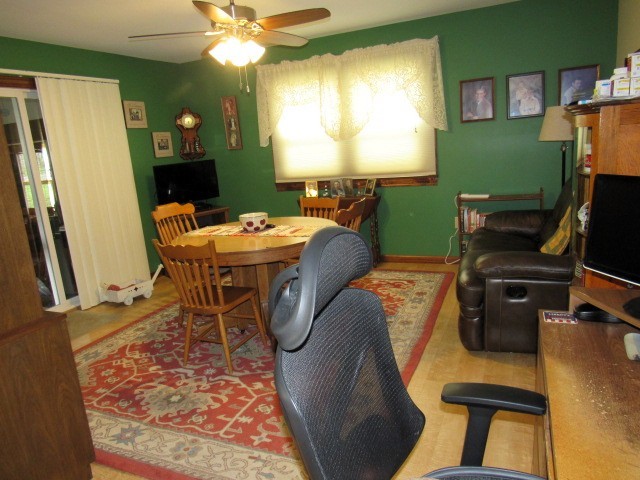 309 Cedar Drive Clinton, IL 61727 - Photo 9 of 20 a view of a dining room with furniture and a window