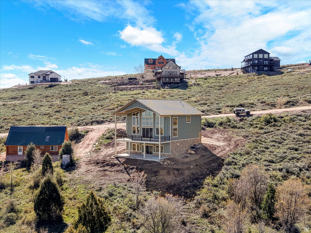 1159 North Broad Hollow Road Garden City, UT 84028 - Photo 17 of 55 Contemporary multi-level residence featuring vertical siding and an expansive A-frame window design