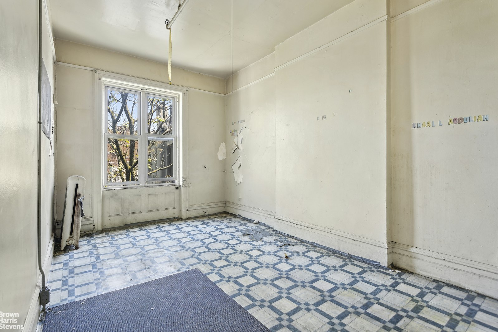 54 Edgecombe Avenue Manhattan, NY 10030 - Photo 2 of 6 a view of an empty room and window