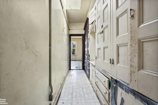 a view of an empty room and window