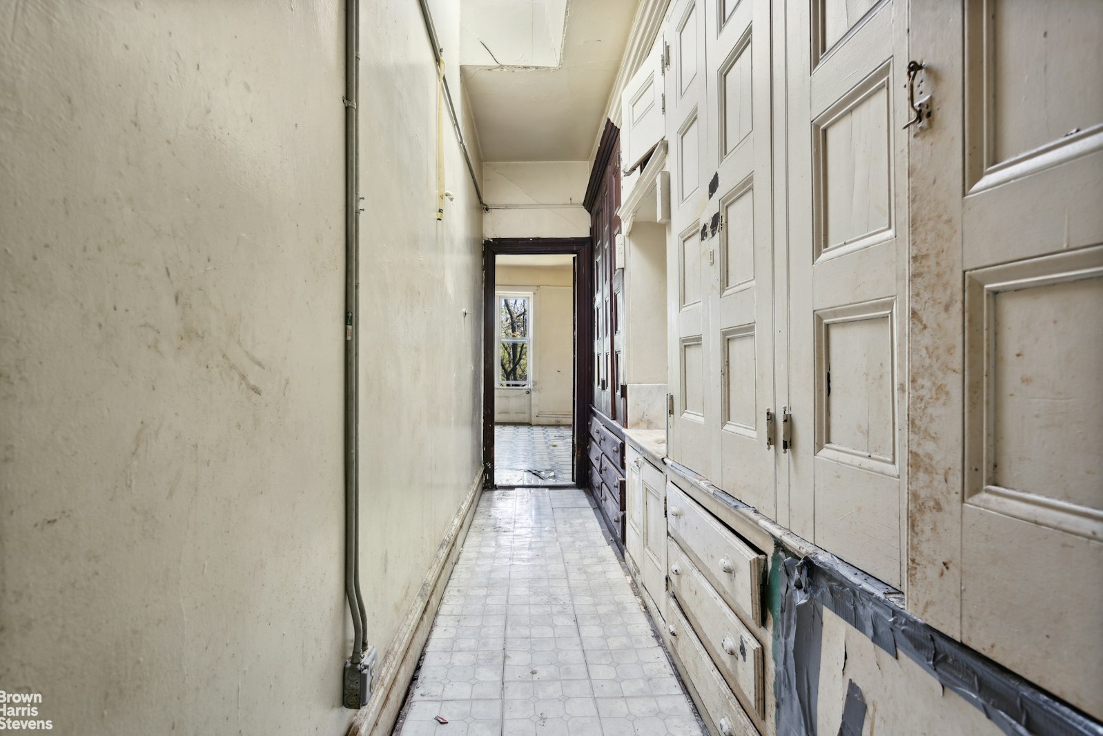 54 Edgecombe Avenue Manhattan, NY 10030 - Photo 3 of 6 a view of a brick house with a large window