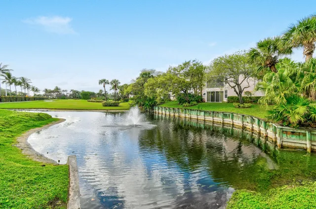 a view of a lake with a big yard