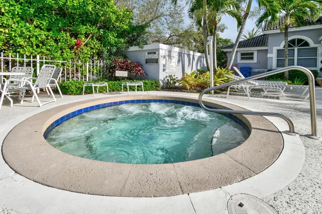 a front view of house with small garden