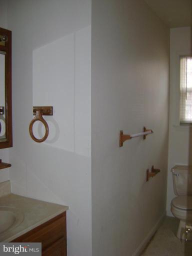 670 San Gabriel Road Lusby, MD 20657 - Photo 9 of 10 a bathroom with a toilet