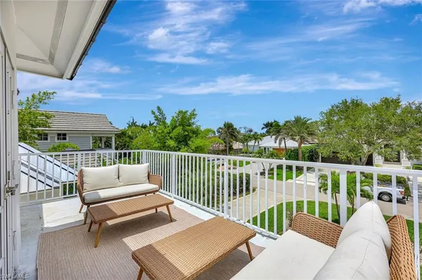 a bathroom with a shower sink and mirror
