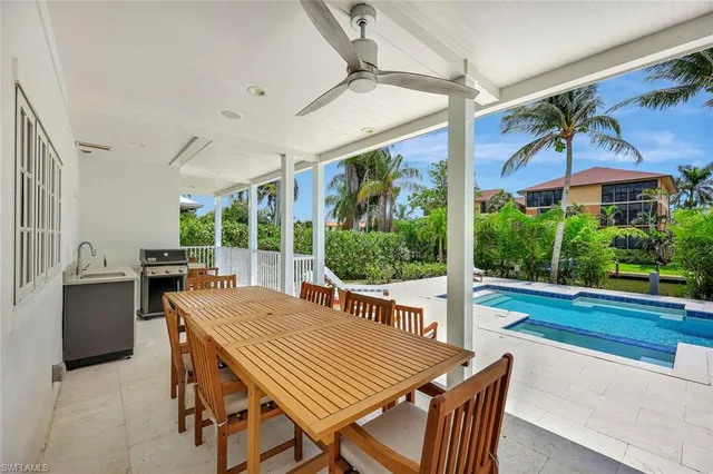 a view of balcony with furniture and wooden deck