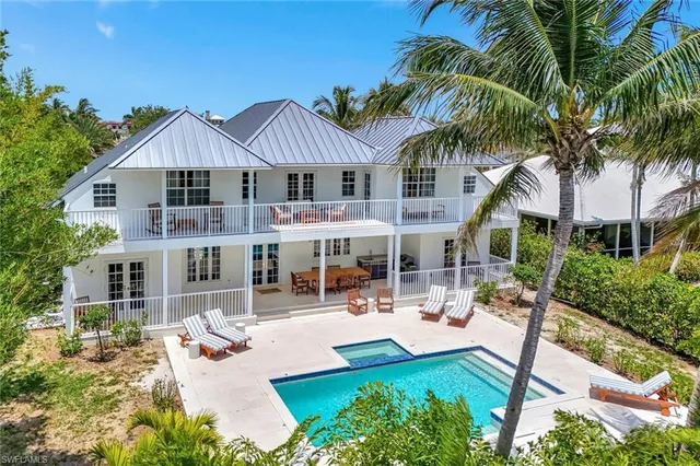 an aerial view of a house with a garden